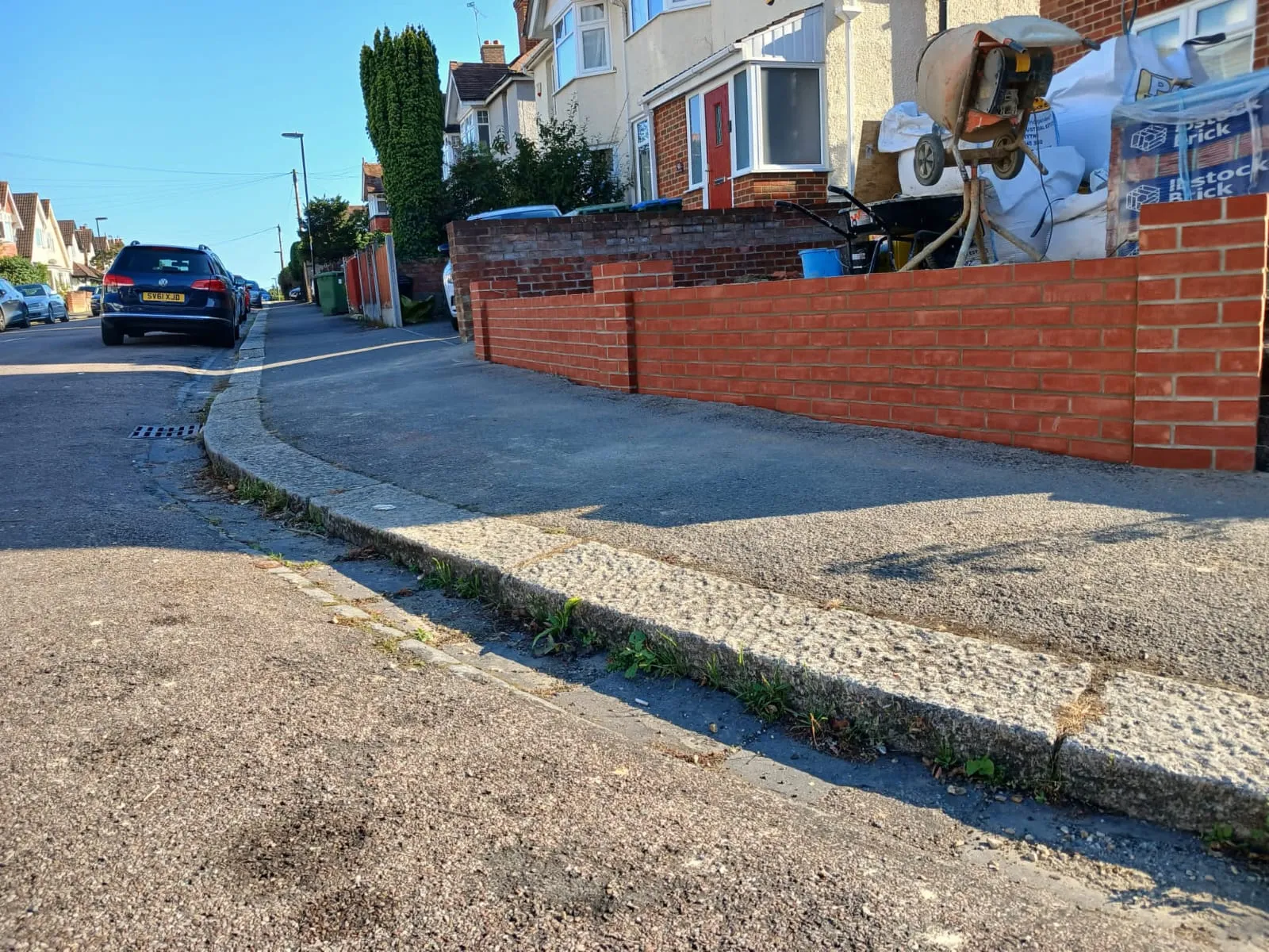 A fire hydrant sitting on the side of a road.